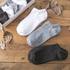 Set of comfortable breathable cotton ankle socks in white, gray, and black for everyday wear and sports
