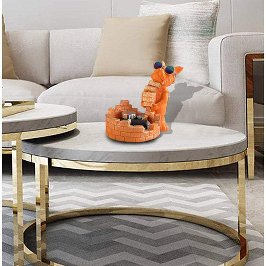 Modern resin cartoon dog desktop ornament with glasses on white marble coffee table in living room