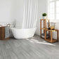 Self-adhesive wood effect vinyl floor planks tiles in bathroom with modern decor