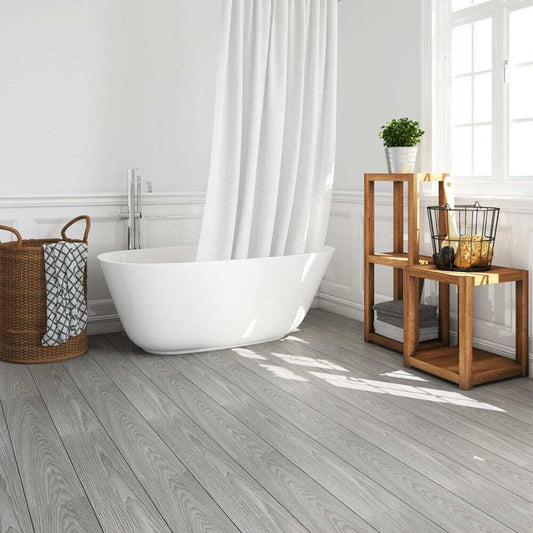 Self-adhesive wood effect vinyl floor planks tiles in bathroom with modern decor