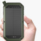 hand holding green wireless solar powerbank with LED indicators and rugged design
