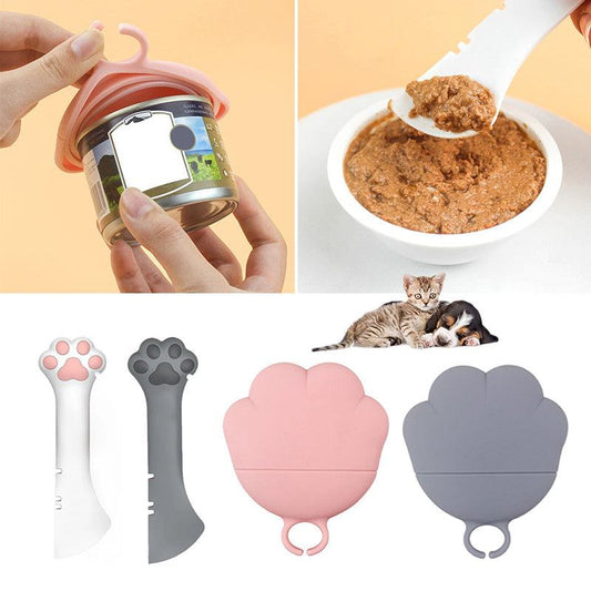 Multifunction pet canned spoon and jar opener with paw design, silicone material, includes spoon and lid for scooping and sealing pet food cans.