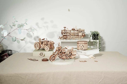 420 piece wooden building block DIY model kit featuring motorcycle, train, and tractor wooden models on display table