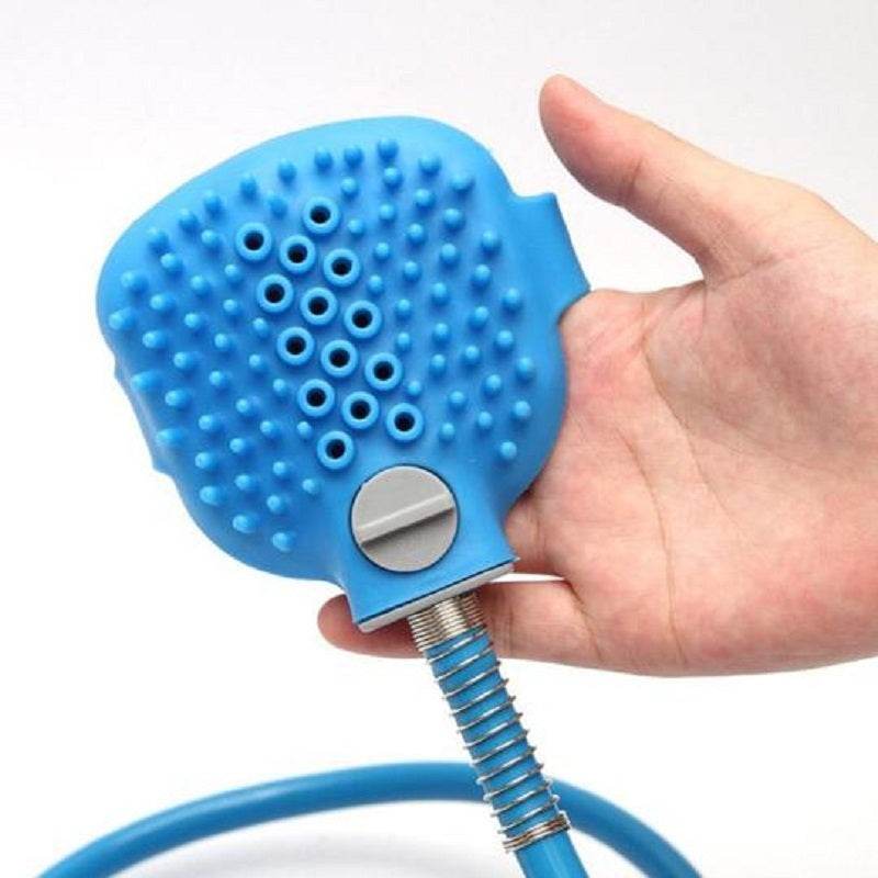 Blue silicone pet bathing tool with massaging bristles and water sprayer handheld shower brush for dogs and cats