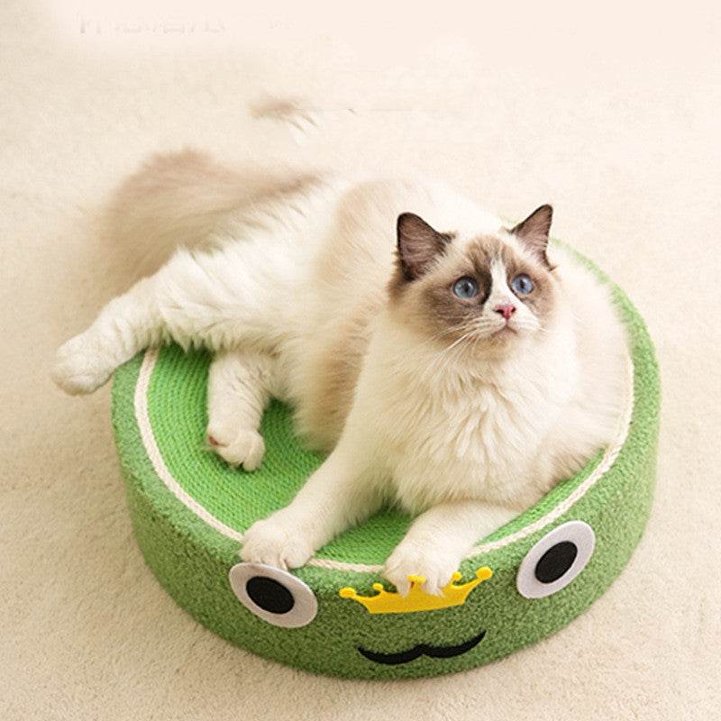 Cat lying on a green frog-themed cat scratch board made of sisal teddy velvet material