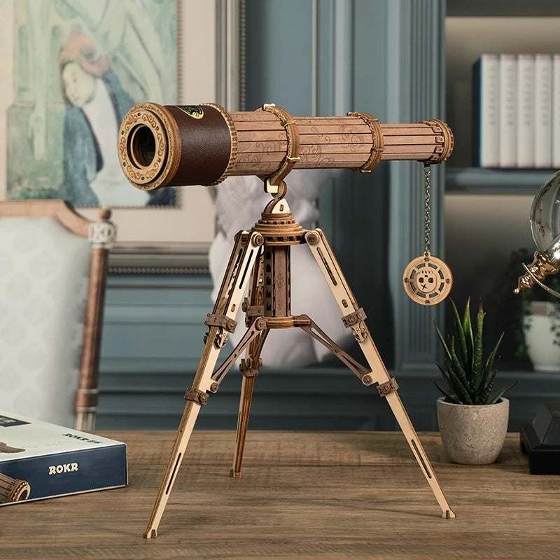 3D wooden puzzle game of a monocular telescope model on a wooden table in a home setting