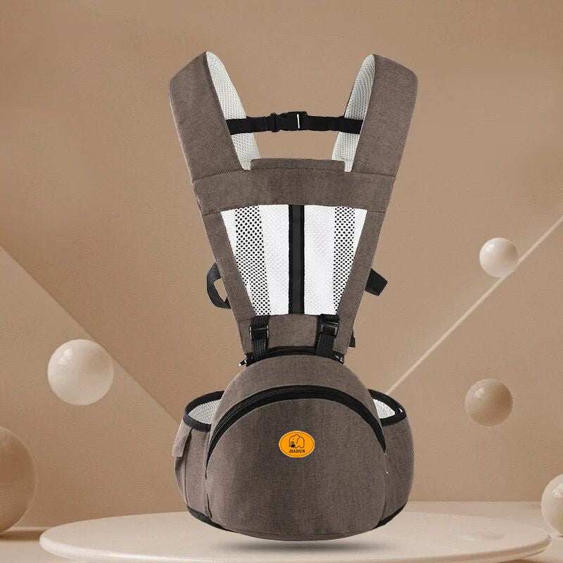 ergonomic brown baby hip seat carrier with adjustable straps and storage pocket