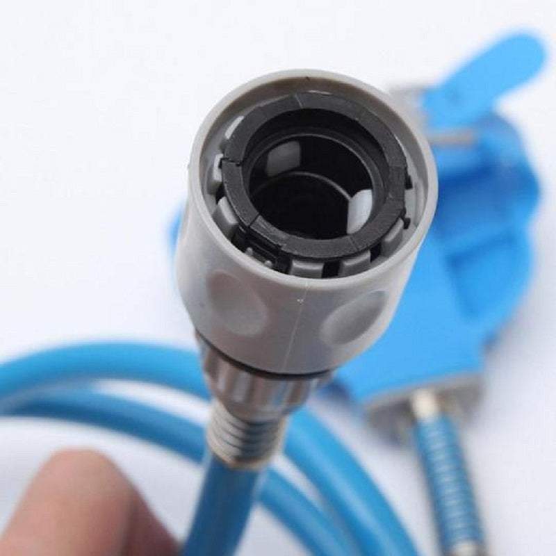Close-up of blue pet bathing tool with faucet adapter and hose for dog and cat grooming