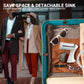Compact clothes steamer packed in suitcase for travel with detachable sink accessory
