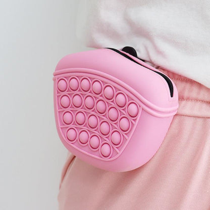 Pink silicone pet treat bag with waist clip and bubble surface design for dog training