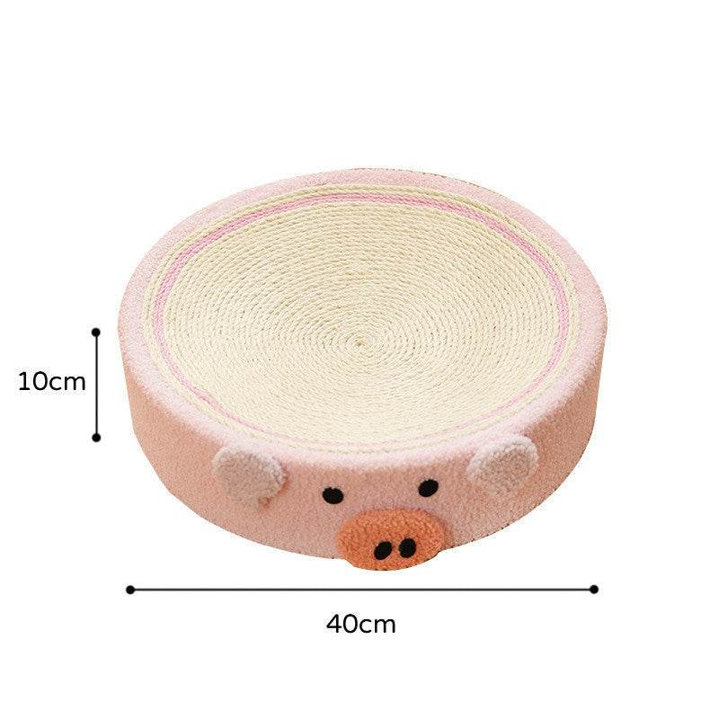 Round pink pig design cat scratch board made of sisal and teddy velvet measuring 40cm by 10cm
