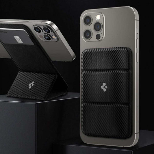 Black magnetic card holder attached to iPhone with textured surface and stand function