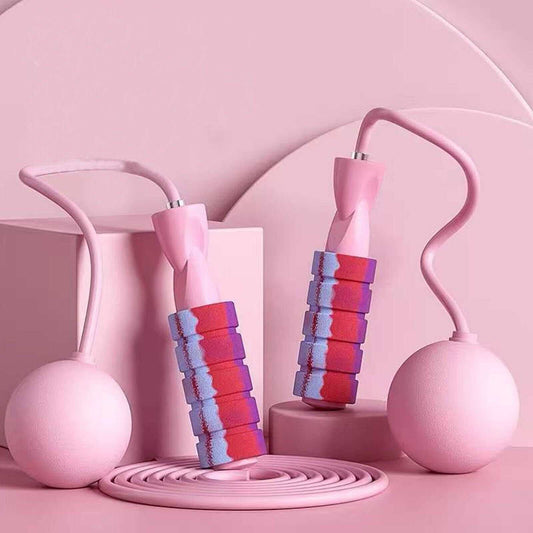 Pink adjustable weighted ropeless jump rope with ergonomic handles and weighted balls for fitness workouts
