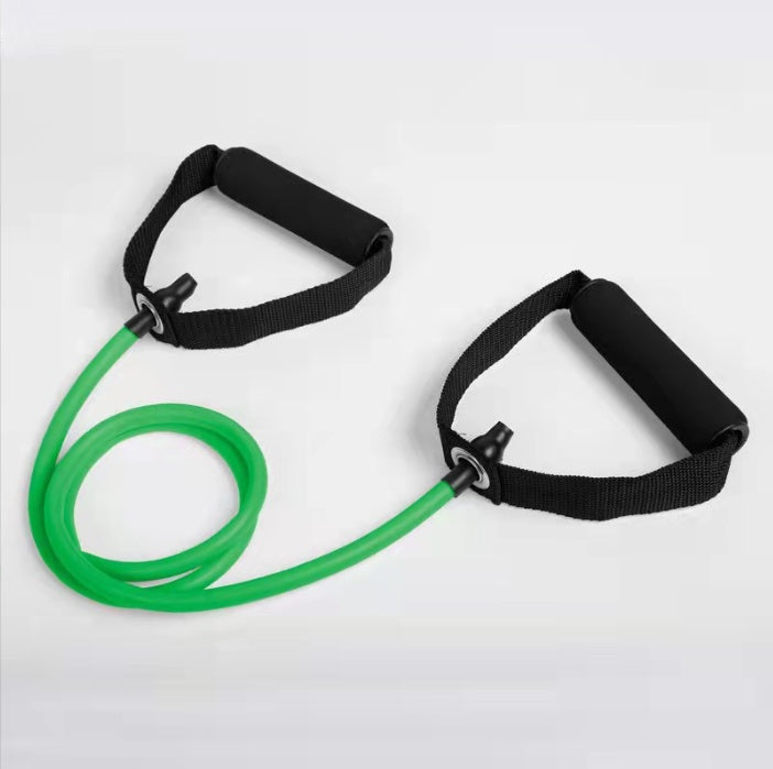 Green latex resistance band with black foam handles for fitness and yoga exercises