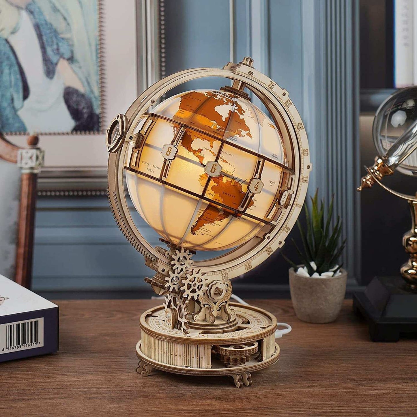 Rokr Luminous Globe 3D wooden model kit with 180 pieces and built-in LED light on desk
