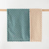 Super soft double-layer baby blanket with dotted backing in teal and beige colors, perfect for newborns and toddlers.