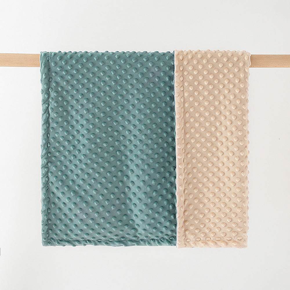Super soft double-layer baby blanket with dotted backing in teal and beige colors, perfect for newborns and toddlers.