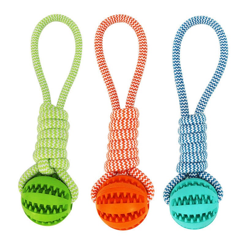 Set of three dog treat balls with durable chewing ropes in green, orange, and blue for small dogs' interactive play and dental health.