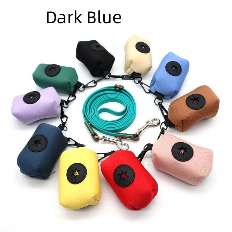Colorful pet supplies stool bag dispensers in various colors arranged in a circle with blue leash in the center